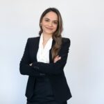 a woman in a black suit